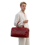 The RED ROUNDED DUFFLE