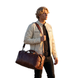 TRAVELING MAN LEATHER JACKET & WEEKENDER BAG