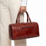 The RED ROUND DUFFLE